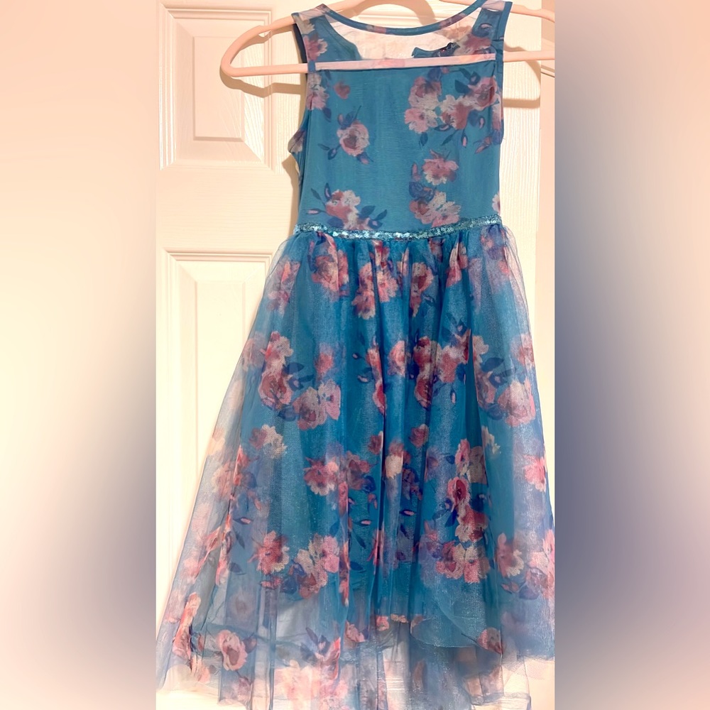 Selling a beautiful blue with accent color tulle dress.